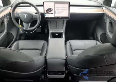 2023 Tesla Model Y from USA, damaged, VIN 7SAYGDED2PF949131